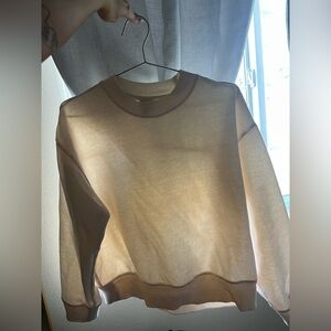 A new day cream sweatshirt